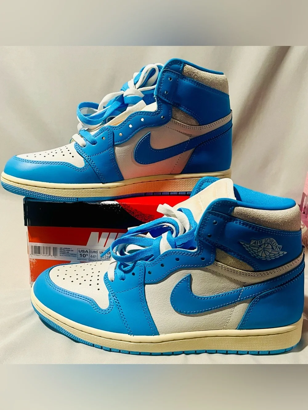 Nike Jordan Retro High-Top Sneakers in Baby Blue and White with Cream Midsole